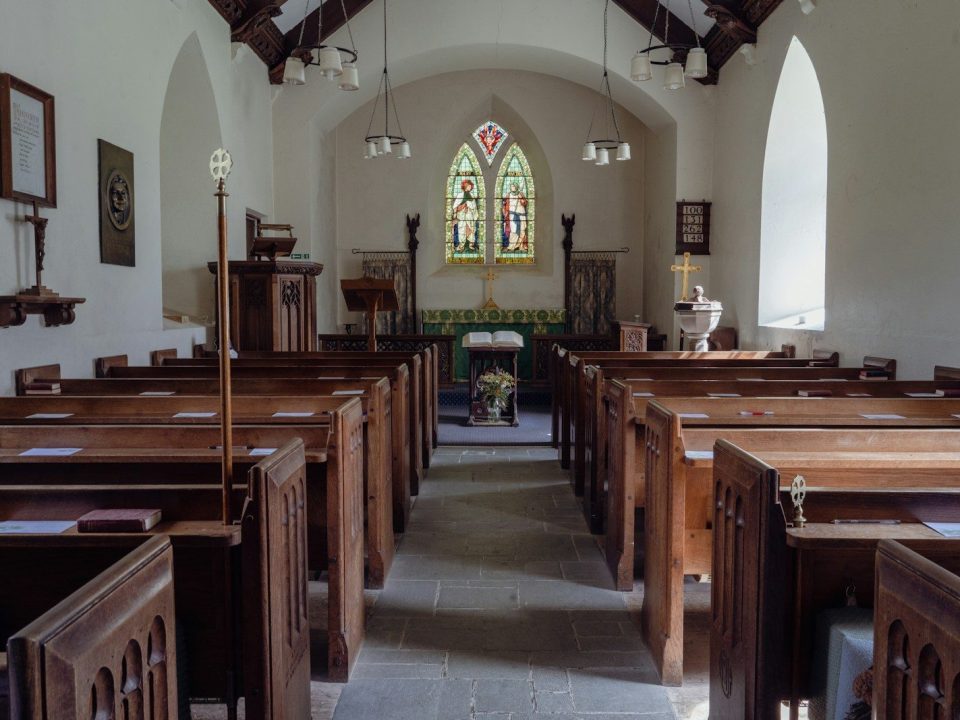 a large church with a large stained glass window