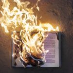 burning open book